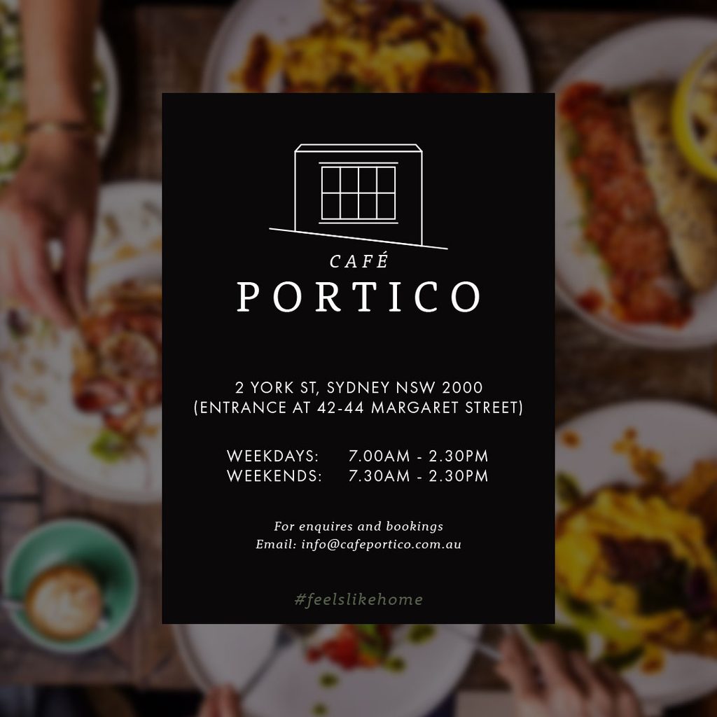 Overhead view of a shared table at Café Portico, Sydney — plates mid-meal and a latte on dark timber